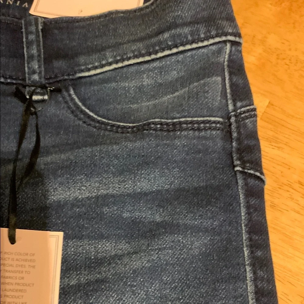 Juicy Couture Blue Skinny Jeans with Raw Hem and Faded Design